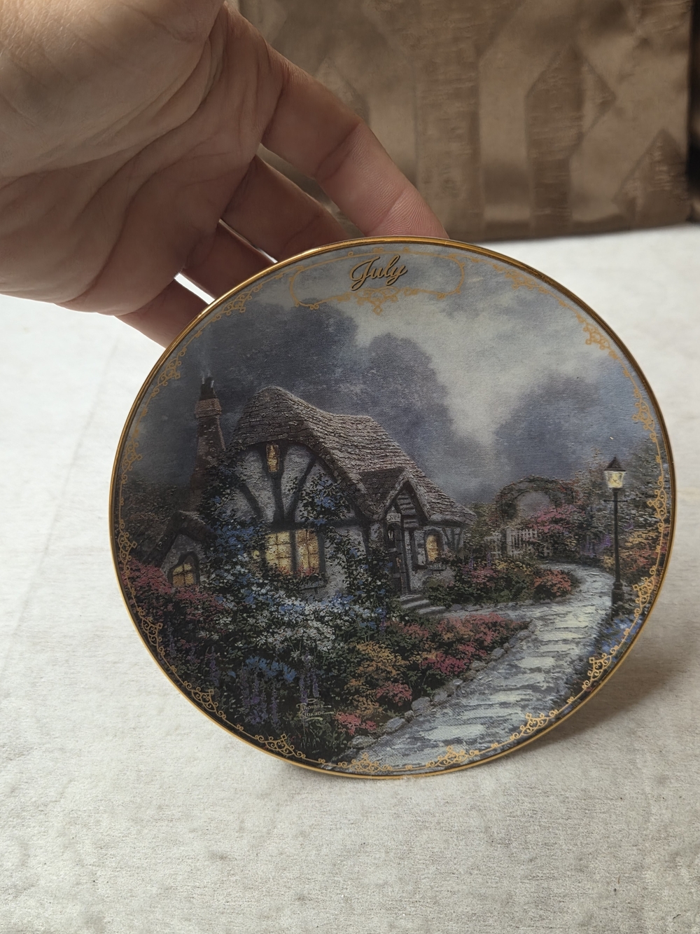 Thomas Kinkade Cottage July Plate in Blue, Gray, Gold